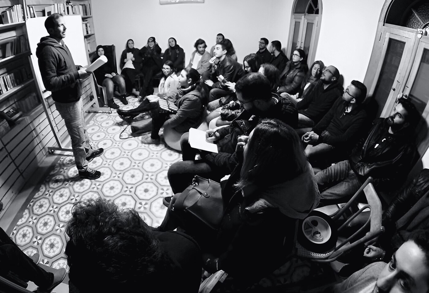 Mike Karame speaking to a small group